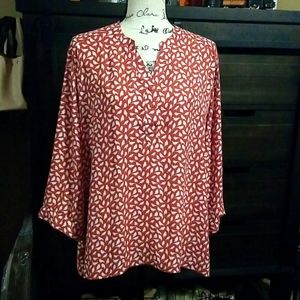 Whimsical bird long sleeve blouse.